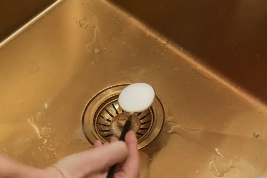 Pouring salt into the drain helps clean clogs.