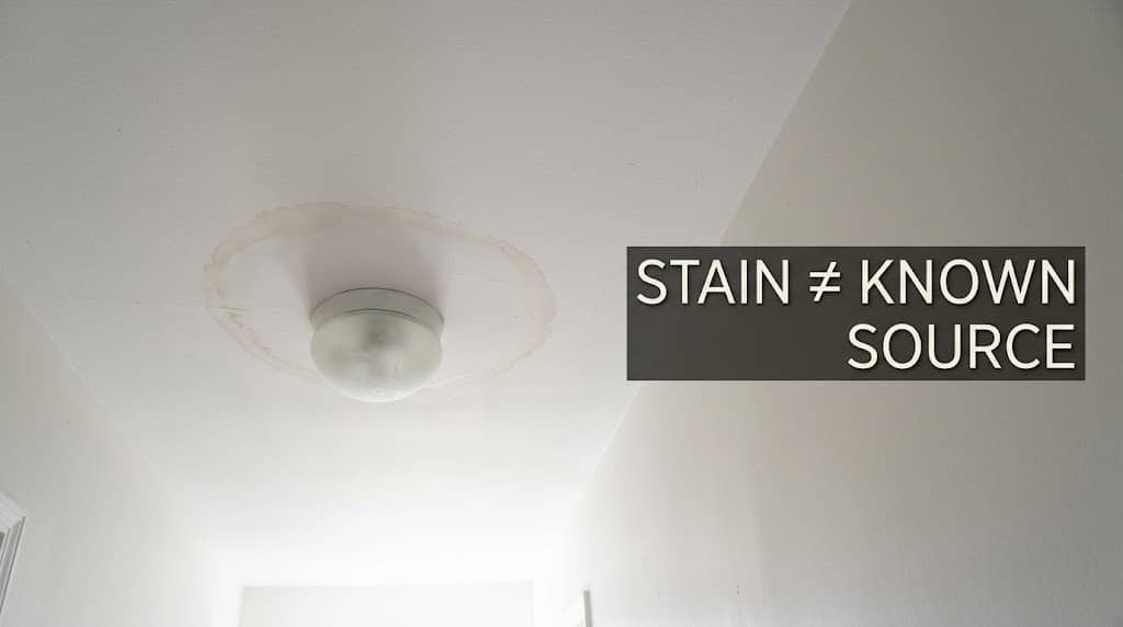 Ceiling water stain showing why moisture findings require investigation of the source